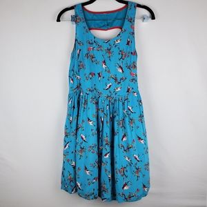 Colorful bird blue dress